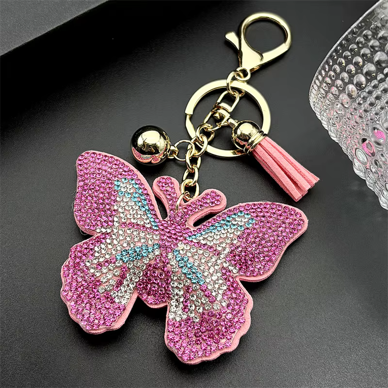 Porte-clés papillon rose pour femmes et hommes, cristal brillant, strass, pompon, sac de voiture, dé