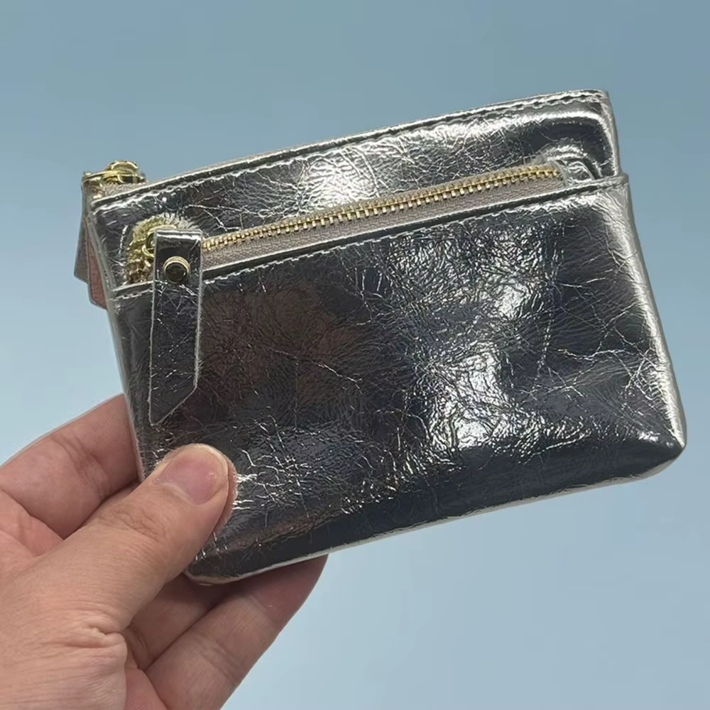 Porte-monnaie en cuir portable à double fermeture éclair