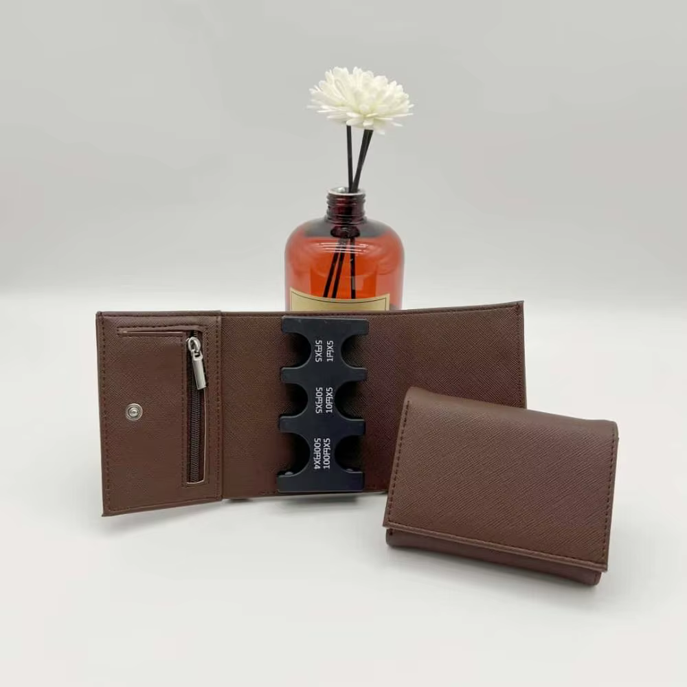 Porte-monnaie portable à trois volets avec boucle anti-perte