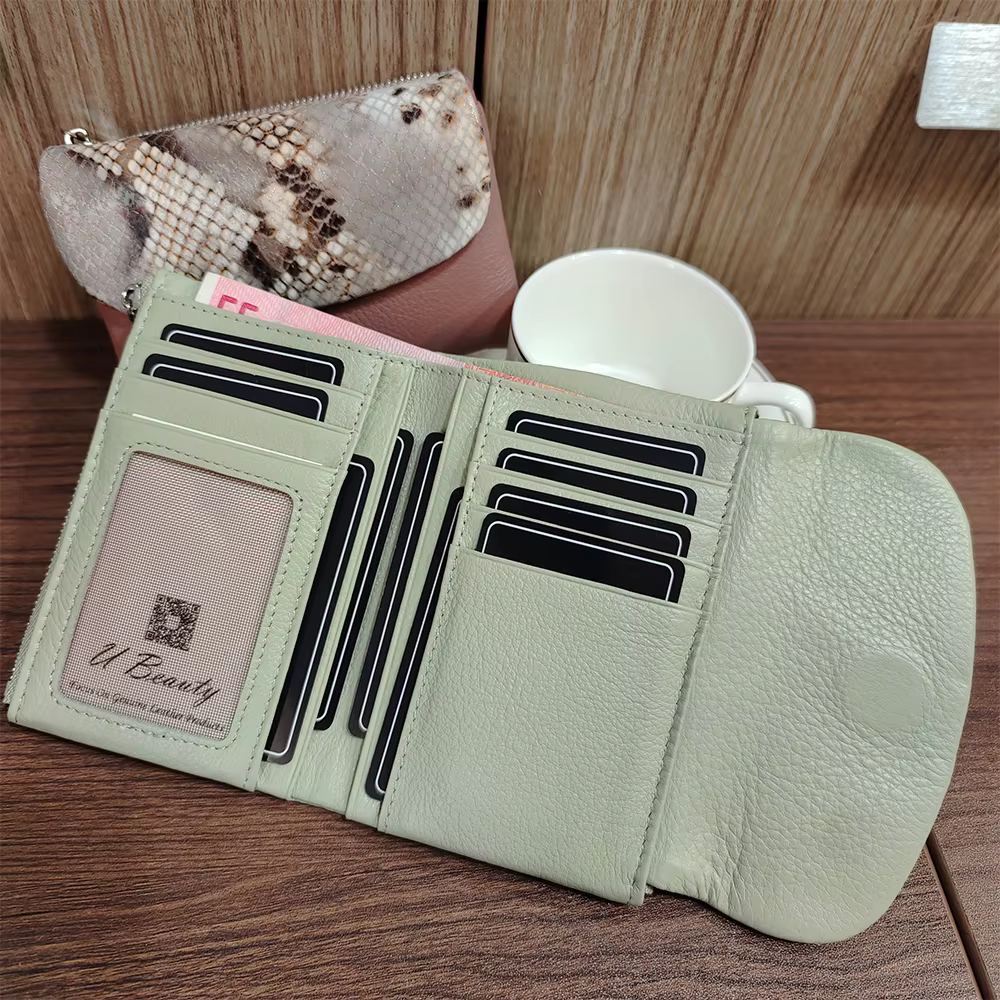 Nouveau 10 couleurs motif serpent en cuir de vache court portefeuille femmes mode Python véritable peau de vache Tri-fold porte-carte sac à main dames