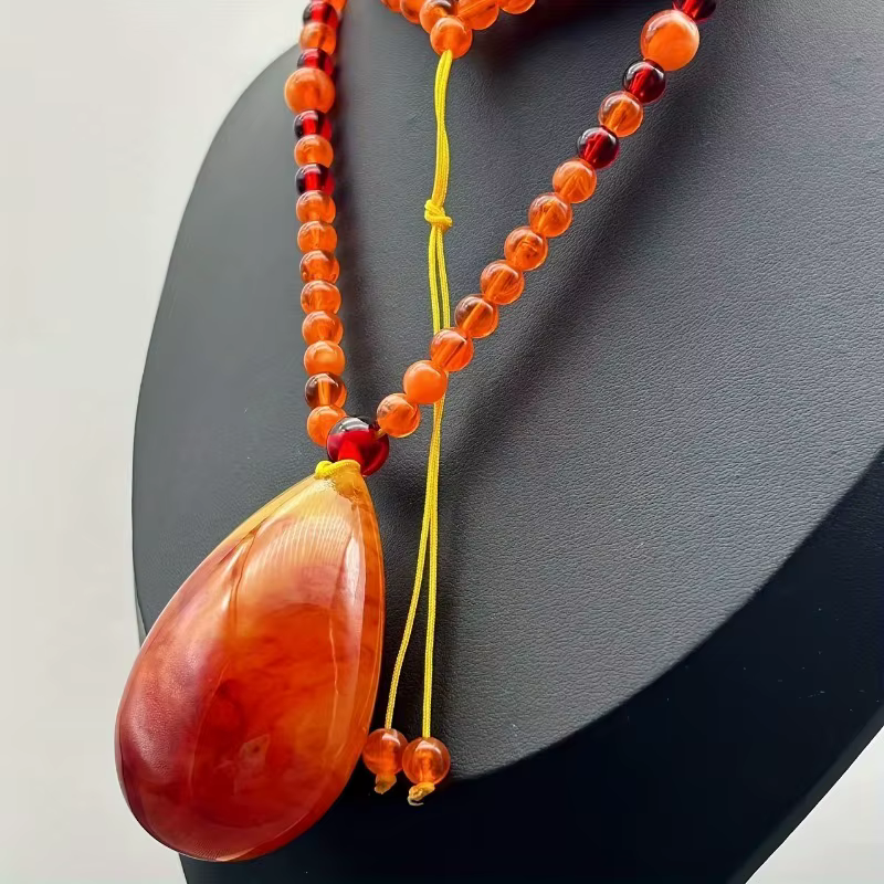 Collier pendentif goutte d'ambre, amulette porte-bonheur, élégant