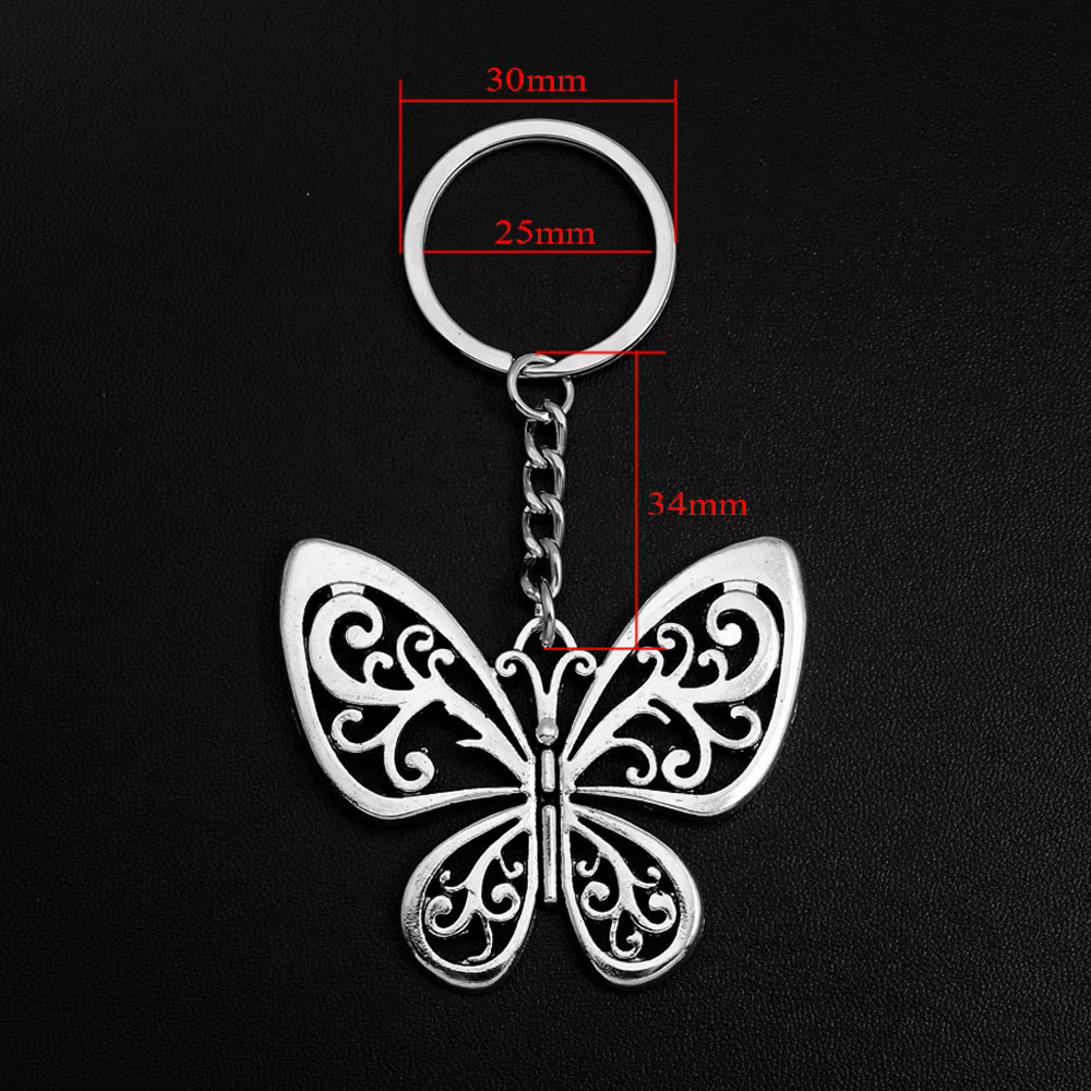 Porte-clés à breloques papillon, pendentifs esthétiques, bijoux, cadeau de vacances, anneau de chaîne pour femmes, sac de petite amie, voiture