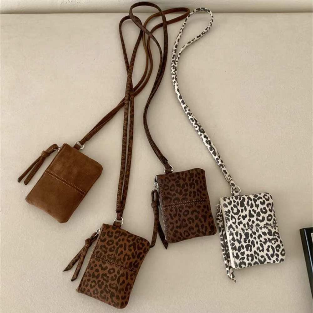 Porte-monnaie portable en daim imprimé léopard pour femme