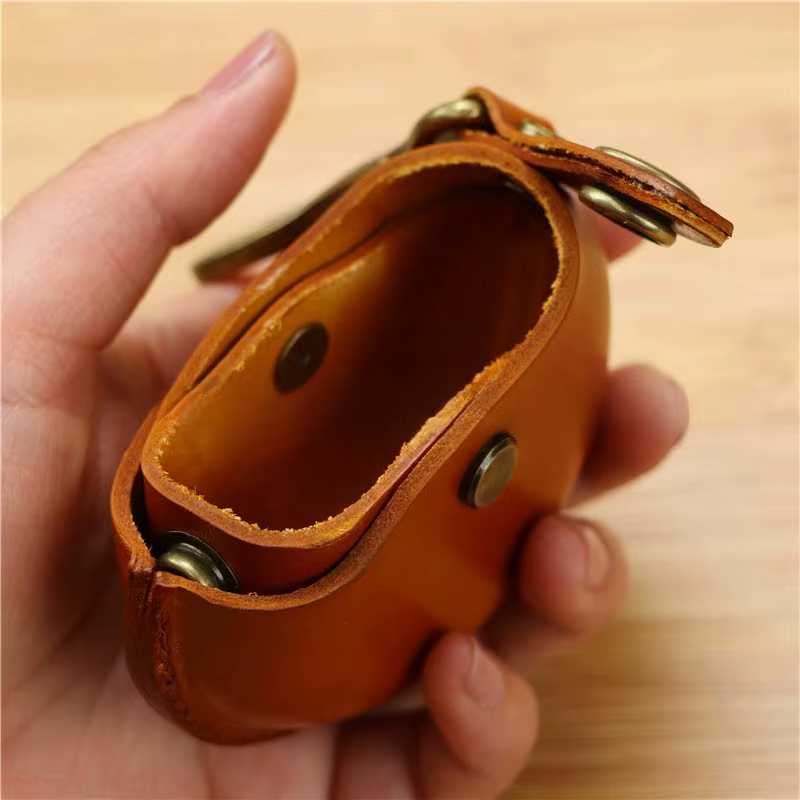 Petite bourse ronde en cuir véritable