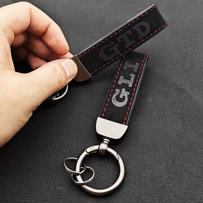 Porte-clés en cuir de luxe de haute qualité pour hommes et femmes