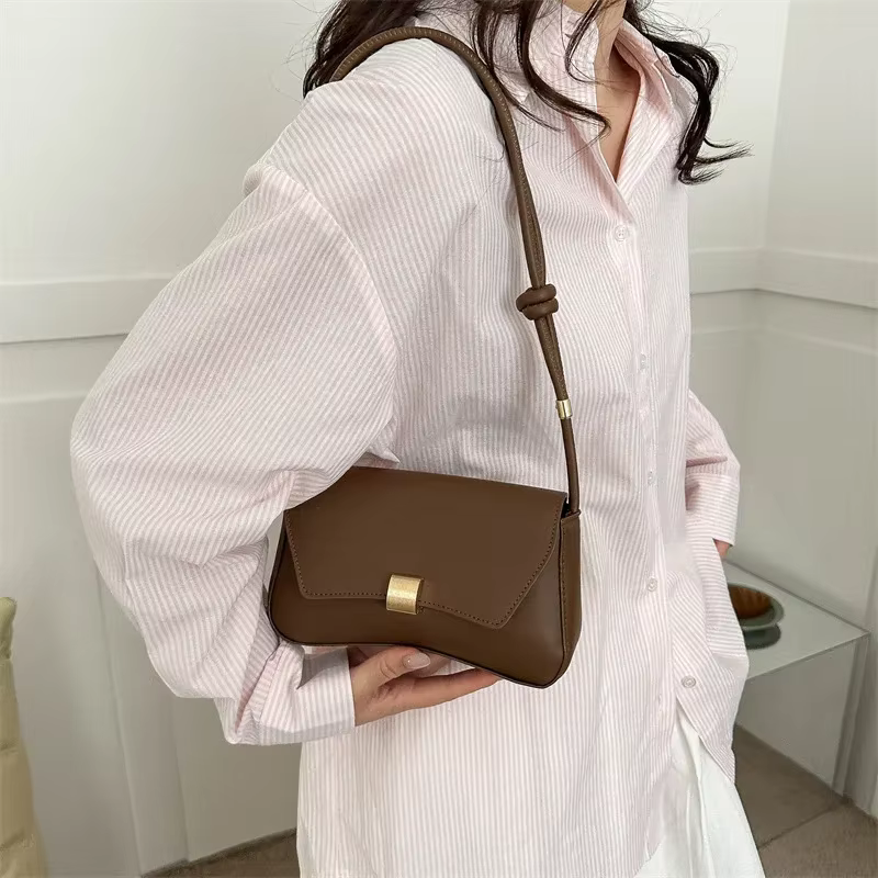 Sac à bandoulière en cuir de couleur unie pour femmes