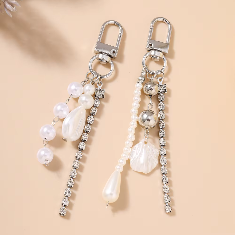 Joli porte-clés en forme de coquille de perles pour femmes et filles
