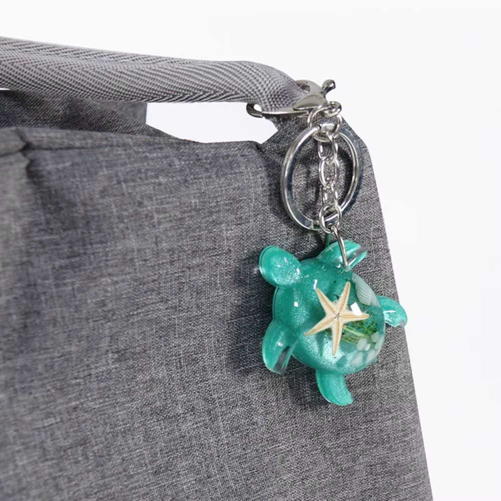 Porte-clés petite tortue qui brille dans le noir