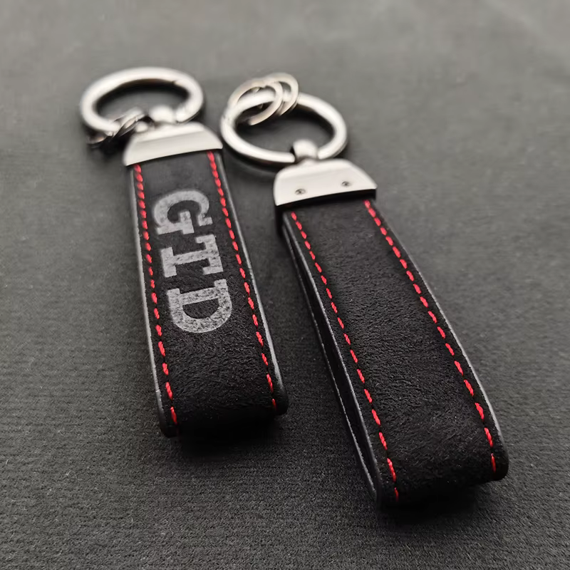 Porte-clés en cuir de luxe de haute qualité pour hommes et femmes