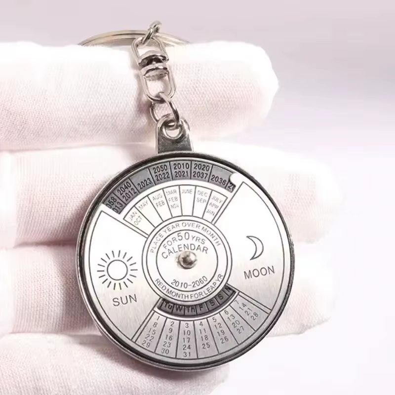 Porte-clés Calendrier Perpétuel Rotatif 50 Ans – Anneau de Clés Créatif en Alliage pour Hommes et Femmes