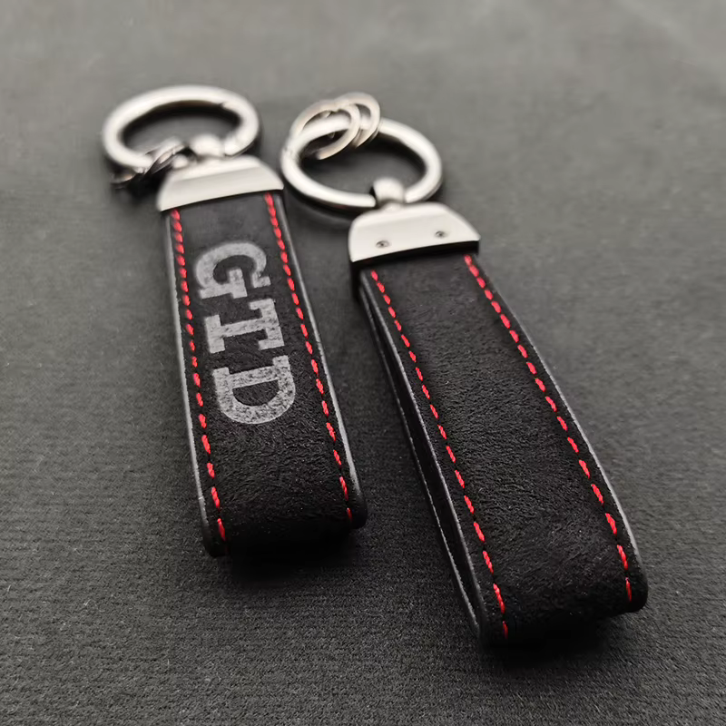 Porte-clés en cuir de luxe de haute qualité pour hommes et femmes
