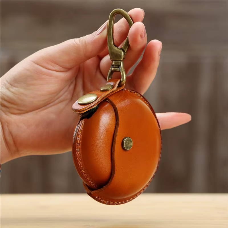 Petite bourse ronde en cuir véritable
