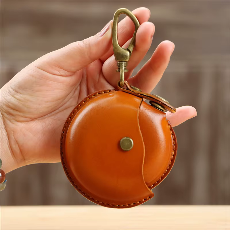Petite bourse ronde en cuir véritable