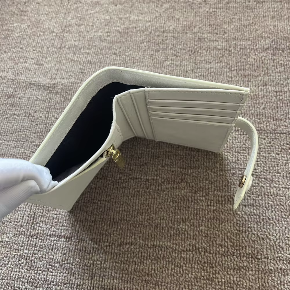 Portefeuille pour femme en cuir de crocodile blanc de l'Himalaya